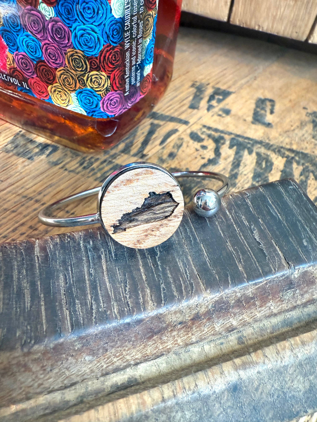 Kentucky State Bracelet made from bourbon whiskey barrels.