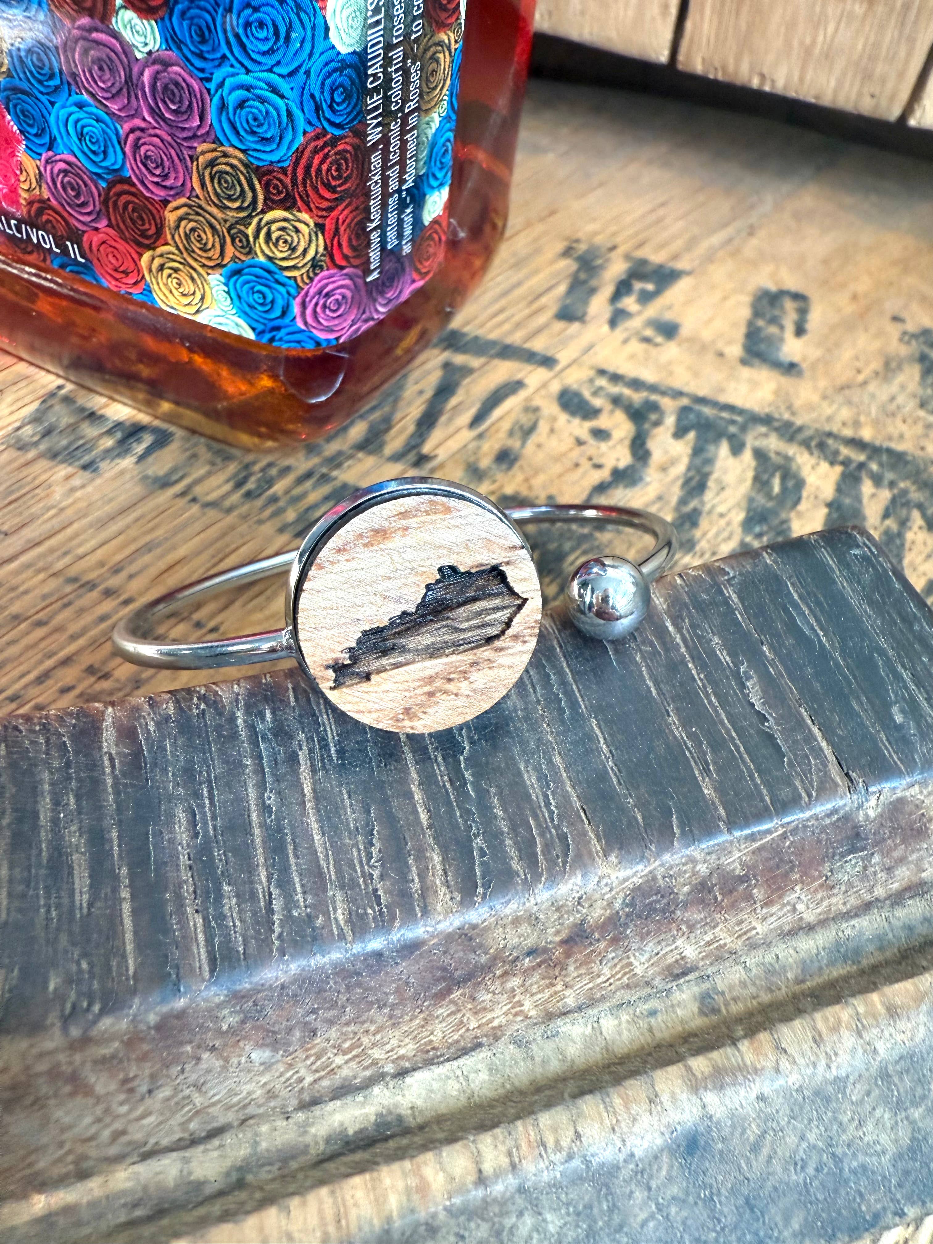 Kentucky State Bracelet made from bourbon whiskey barrels.