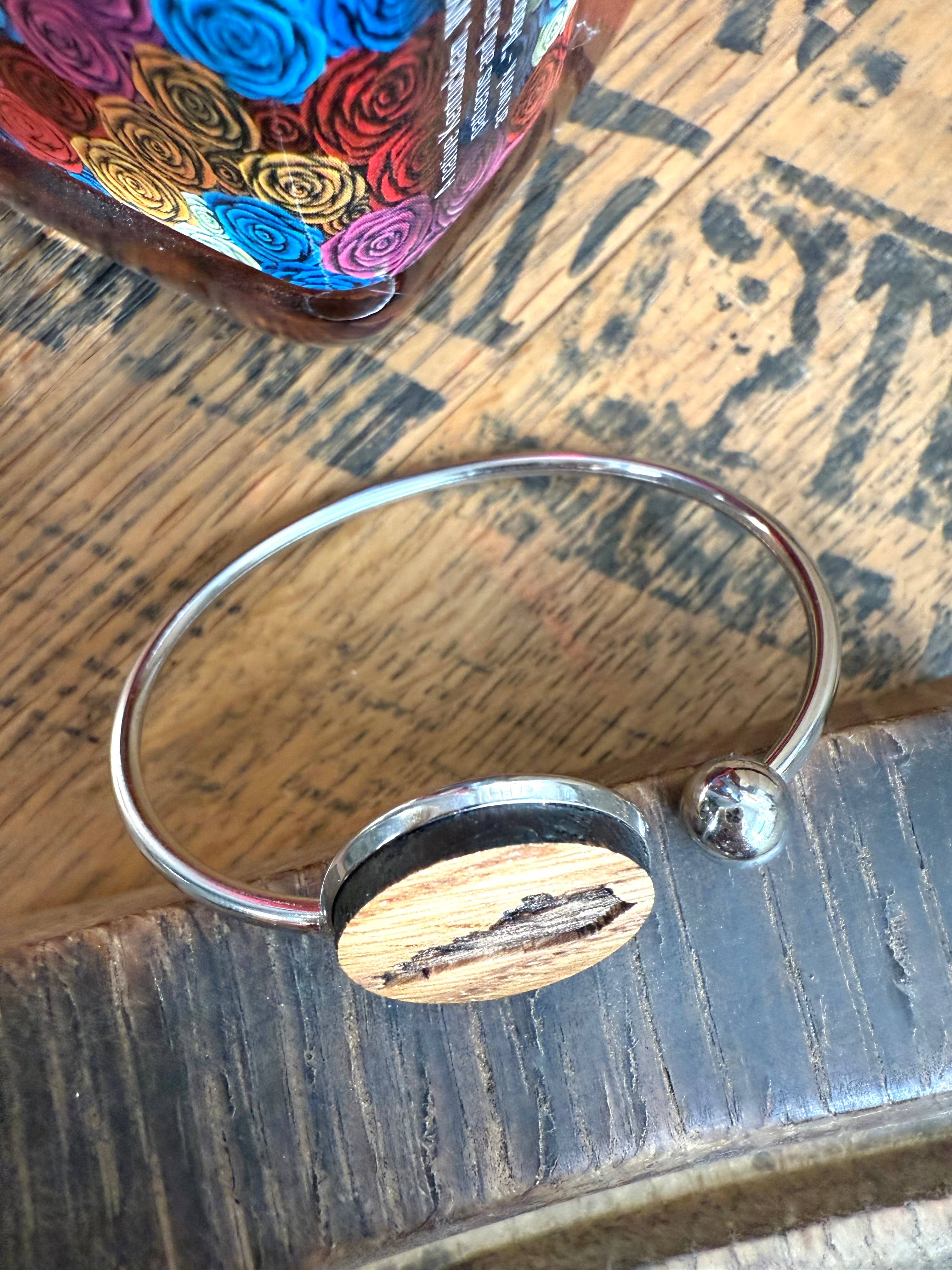 Kentucky State Bracelet made from bourbon whiskey barrels.