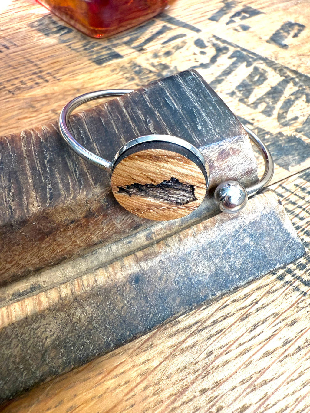 Kentucky State Bracelet made from bourbon whiskey barrels.